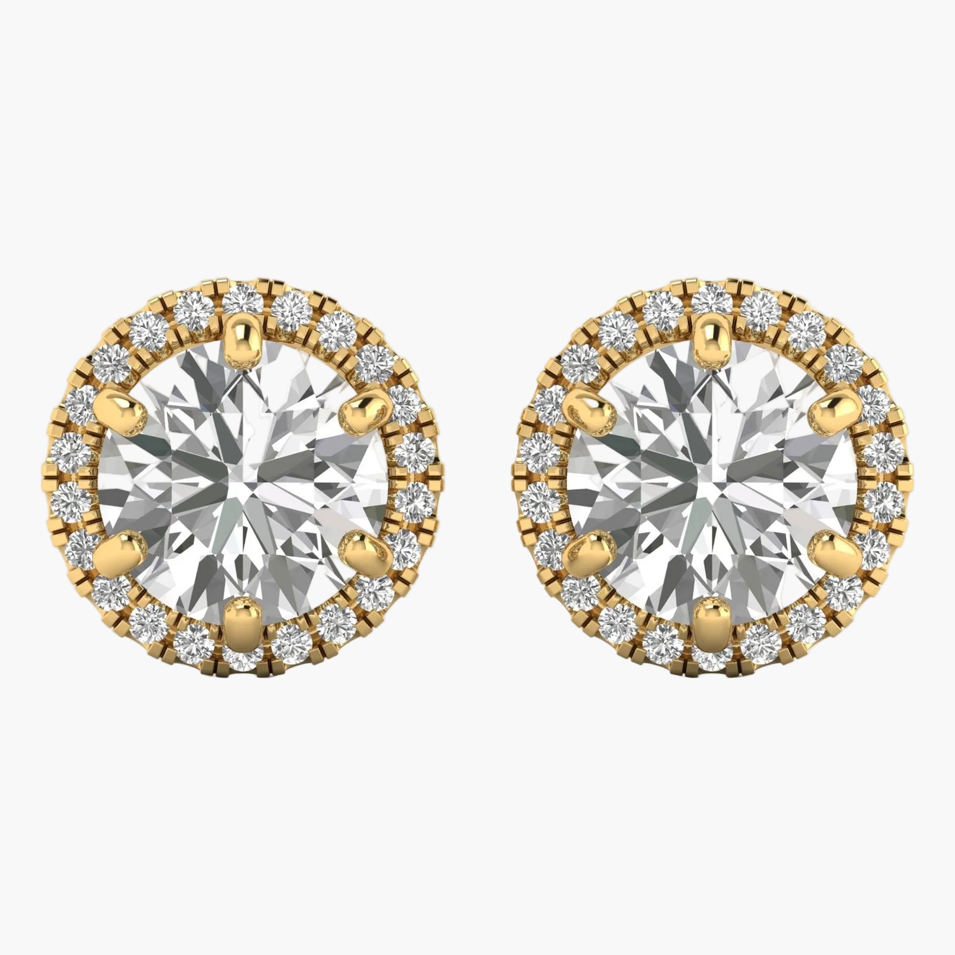 Gold and silver round earrings with clear gemstones on a white background