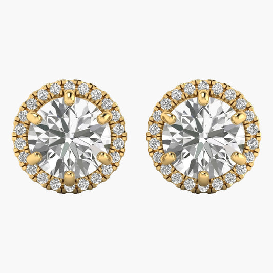 Gold and silver round earrings with clear gemstones on a white background