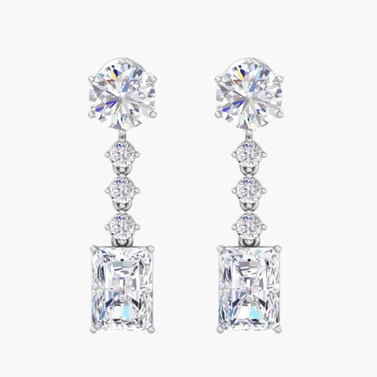 Pair of diamond earrings on a white background