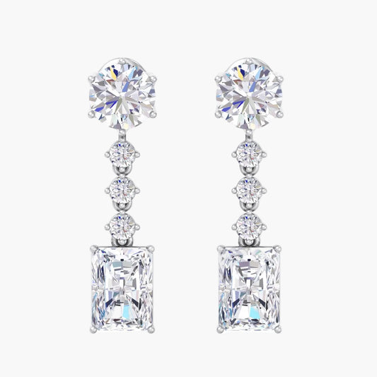 Pair of diamond earrings on a white background