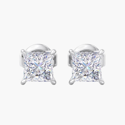Pair of silver stud earrings with clear gemstones on a white background