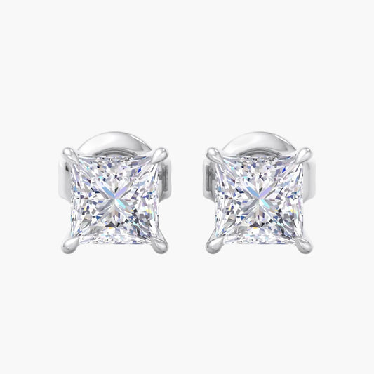 Pair of silver stud earrings with clear gemstones on a white background