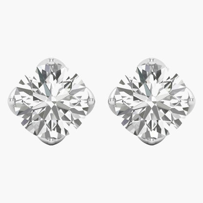 Pair of diamond stud earrings on a white background