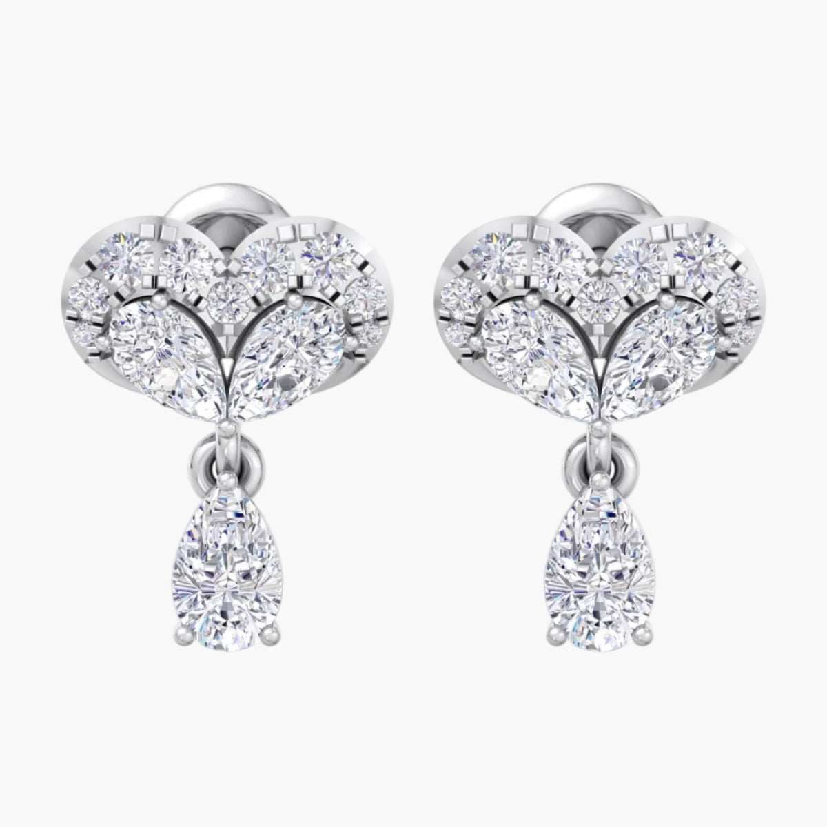Heart-shaped earrings with diamond-like stones on a white background