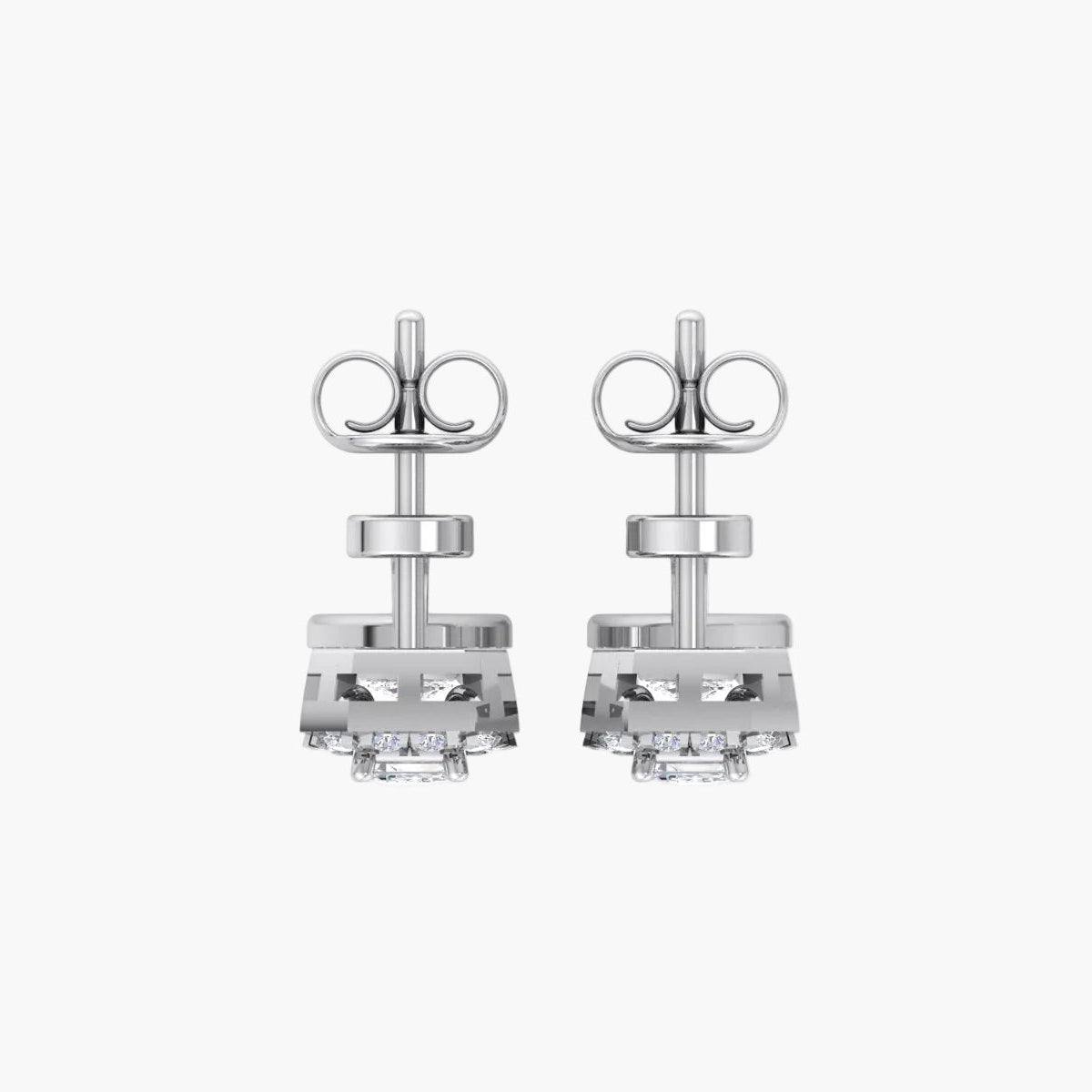 Pair of silver earrings with clear stones on a white background