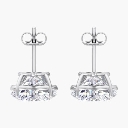 Pair of silver stud earrings with clear gemstones on a white background