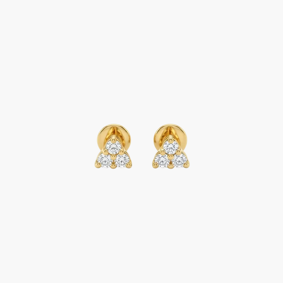 A pair of gold stud earrings with a triangular cluster of small clear gemstones, shown on a plain light gray background.