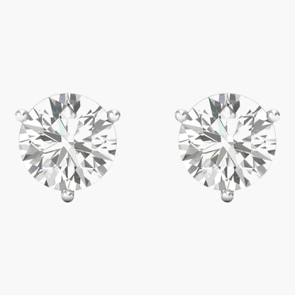 Pair of diamond stud earrings on a white background
