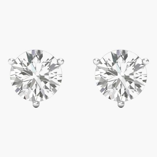 Pair of diamond stud earrings on a white background