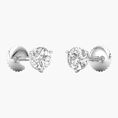 Pair of diamond stud earrings on a white background