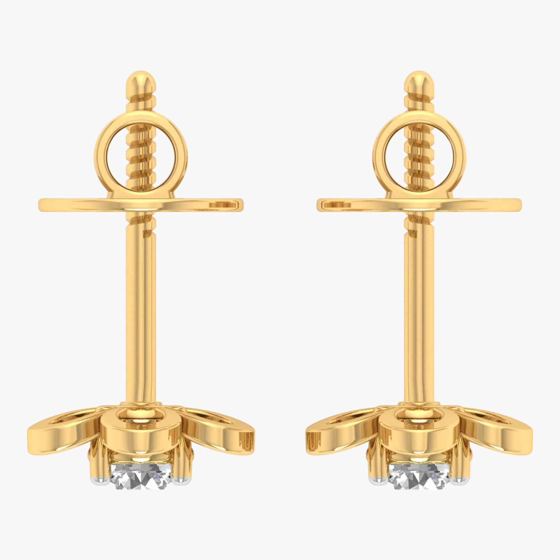 Pair of gold earrings with intricate designs on a white background