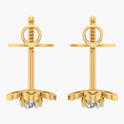 Pair of gold earrings with intricate designs on a white background