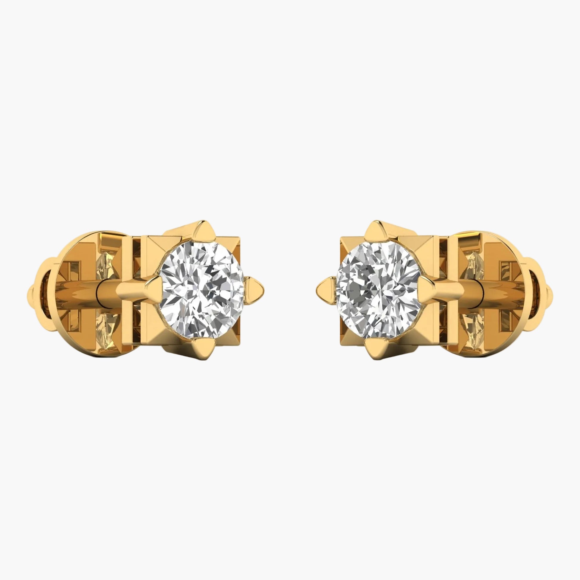 Gold earrings with clear gemstones on a white background