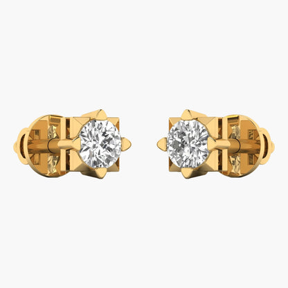 Gold earrings with clear gemstones on a white background