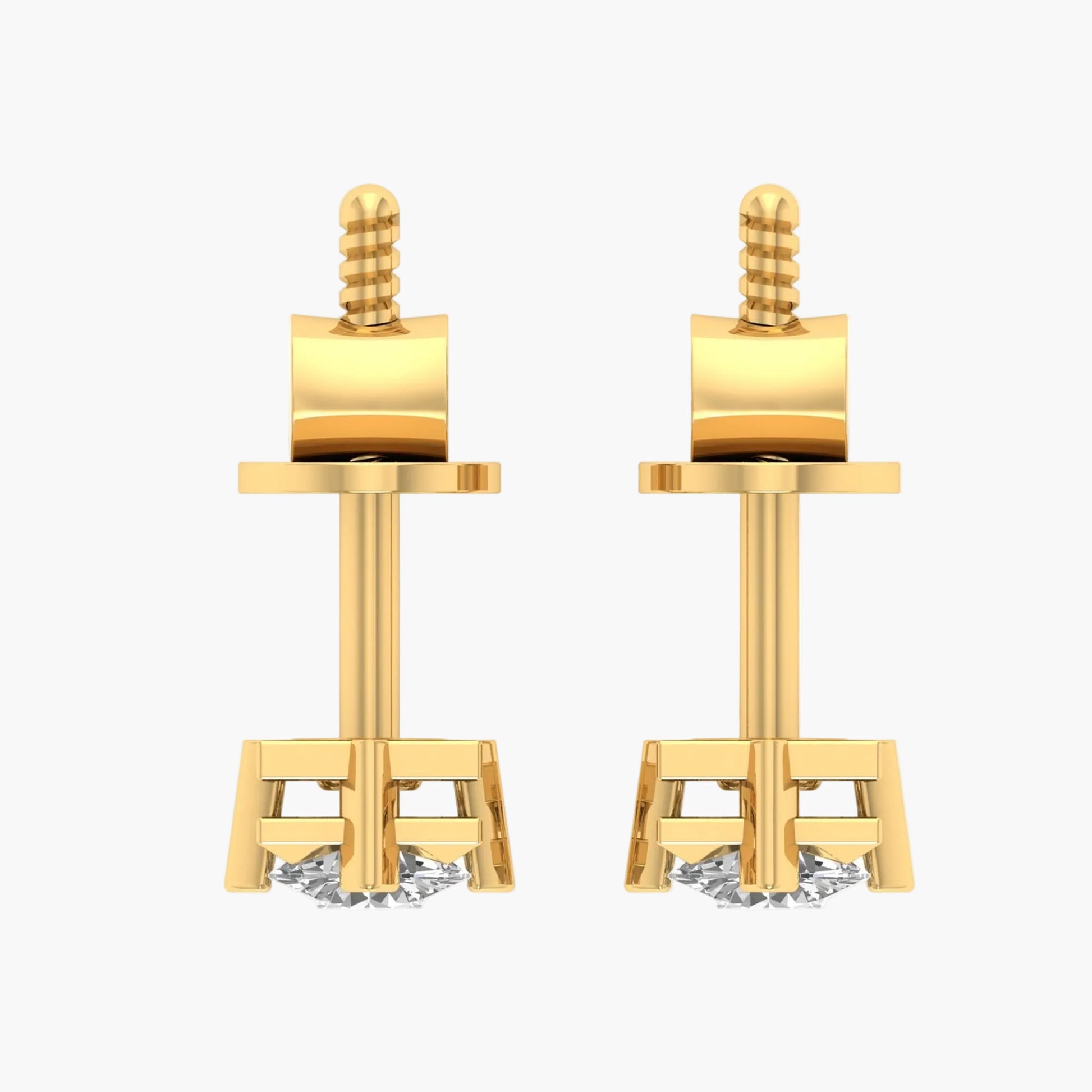 Pair of gold earrings on a white background