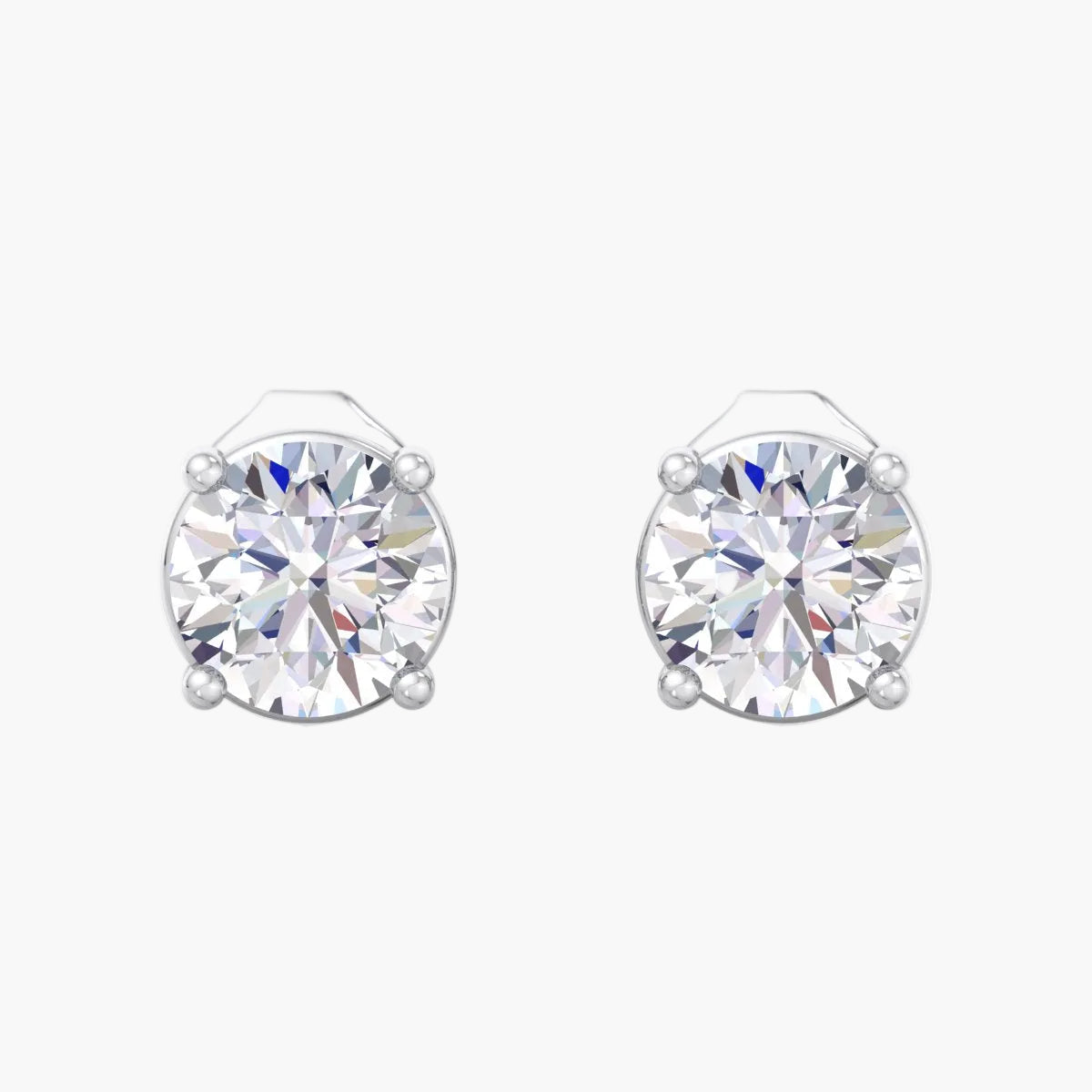 Pair of silver stud earrings with clear gemstones on a white background