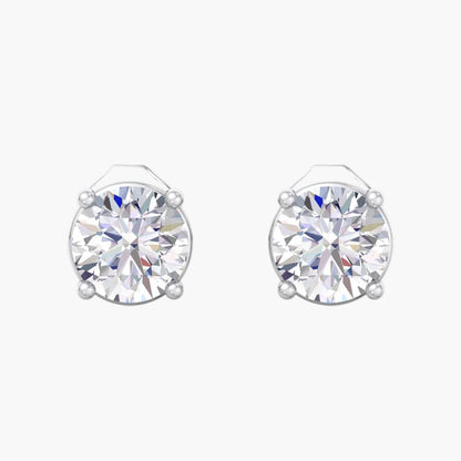 Pair of silver stud earrings with clear gemstones on a white background