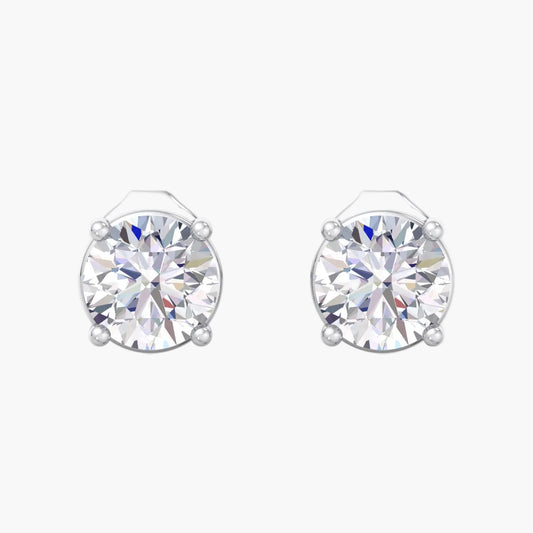 Pair of silver stud earrings with clear gemstones on a white background