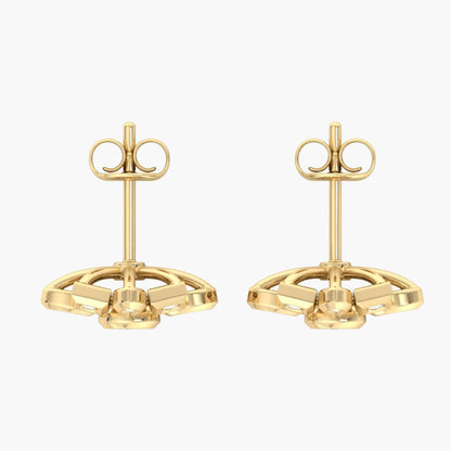 Pair of gold earrings on white background