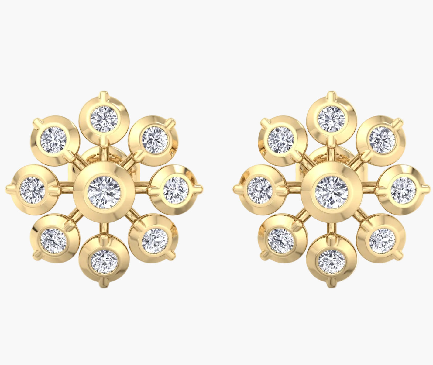 Gold earrings with diamond-like stones on a white background