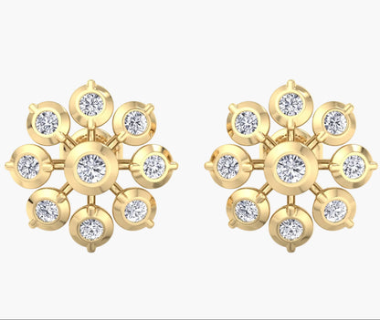 Gold earrings with diamond-like stones on a white background