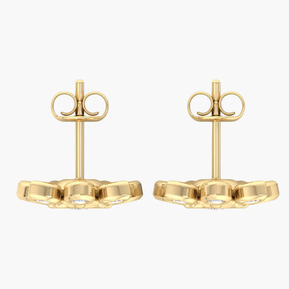 Pair of gold earrings on a white background