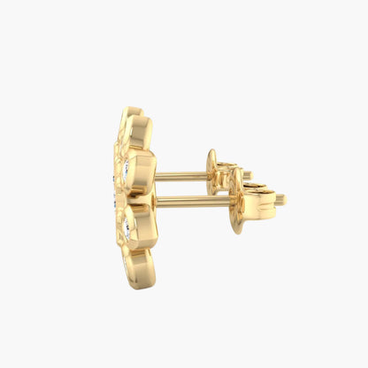 Gold earrings on a white background