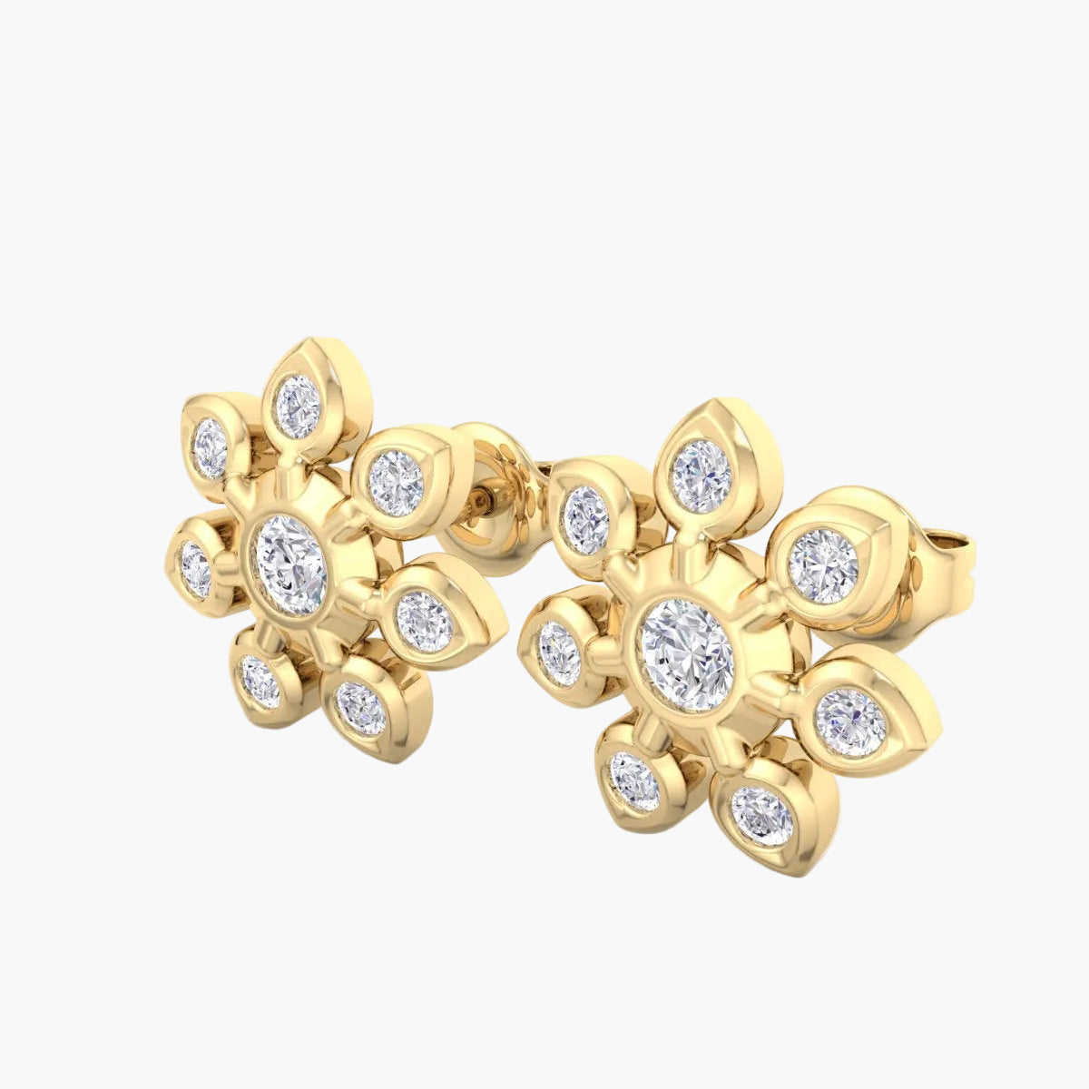 Gold earrings with diamond accents on a white background