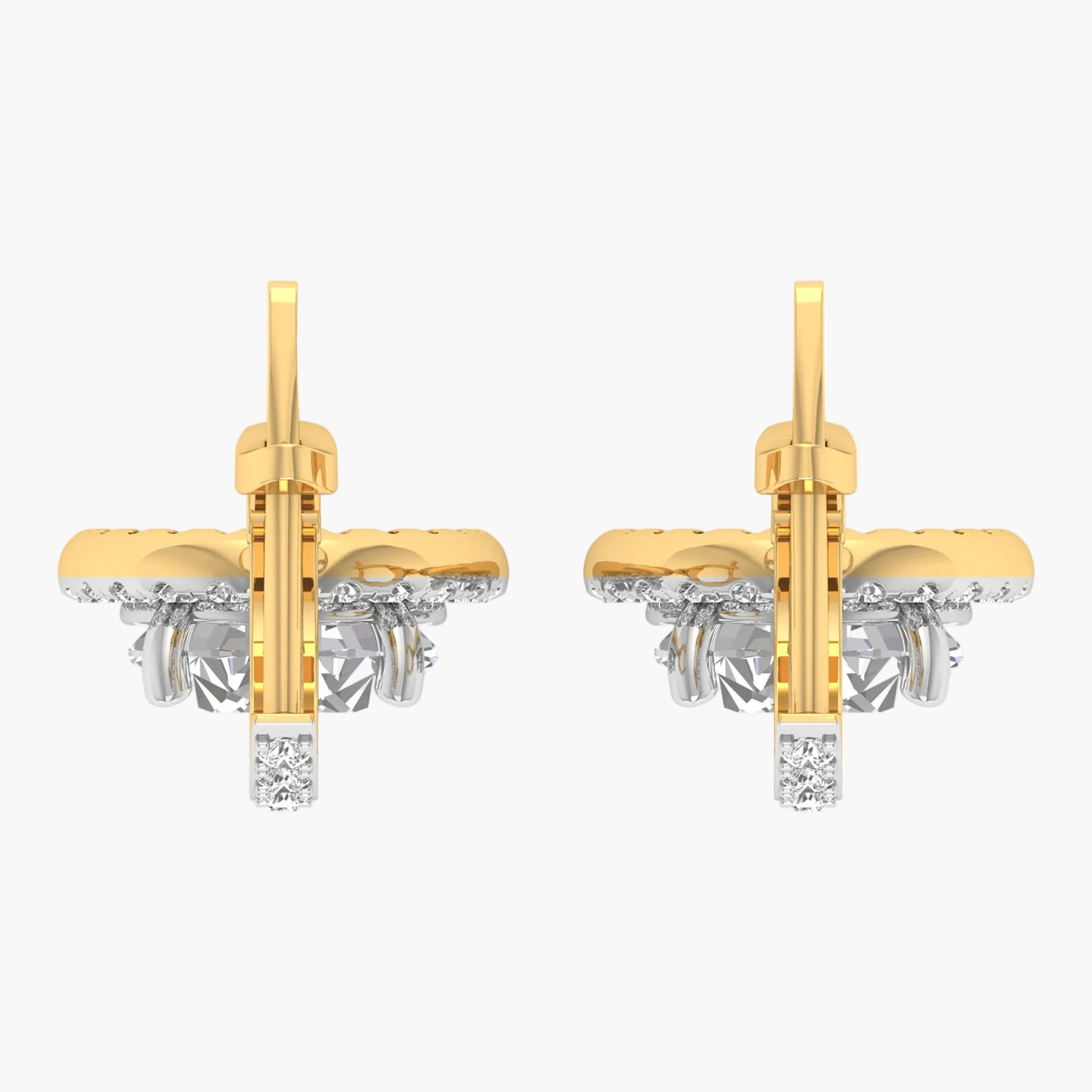Gold and silver earrings on a white background