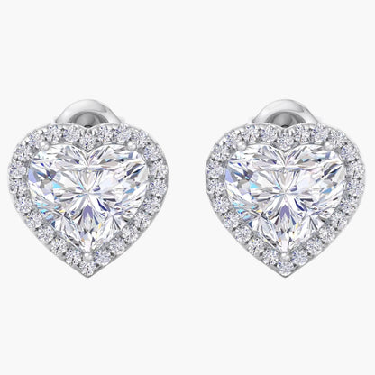 Heart-shaped diamond earrings on a white background