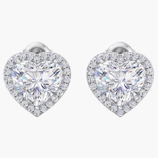 Heart-shaped diamond earrings on a white background