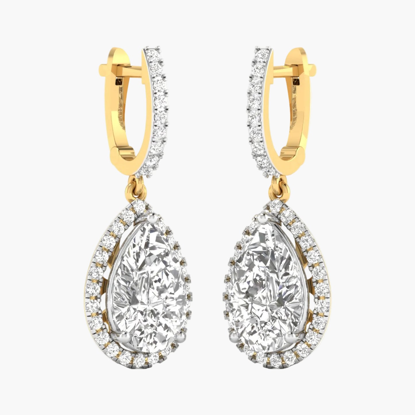 Gold hoop earrings with teardrop-shaped clear gemstones on a white background