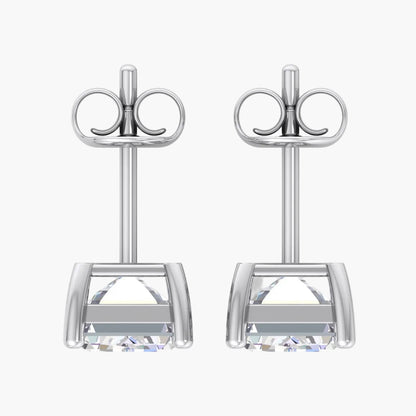 Pair of silver stud earrings on a white background
