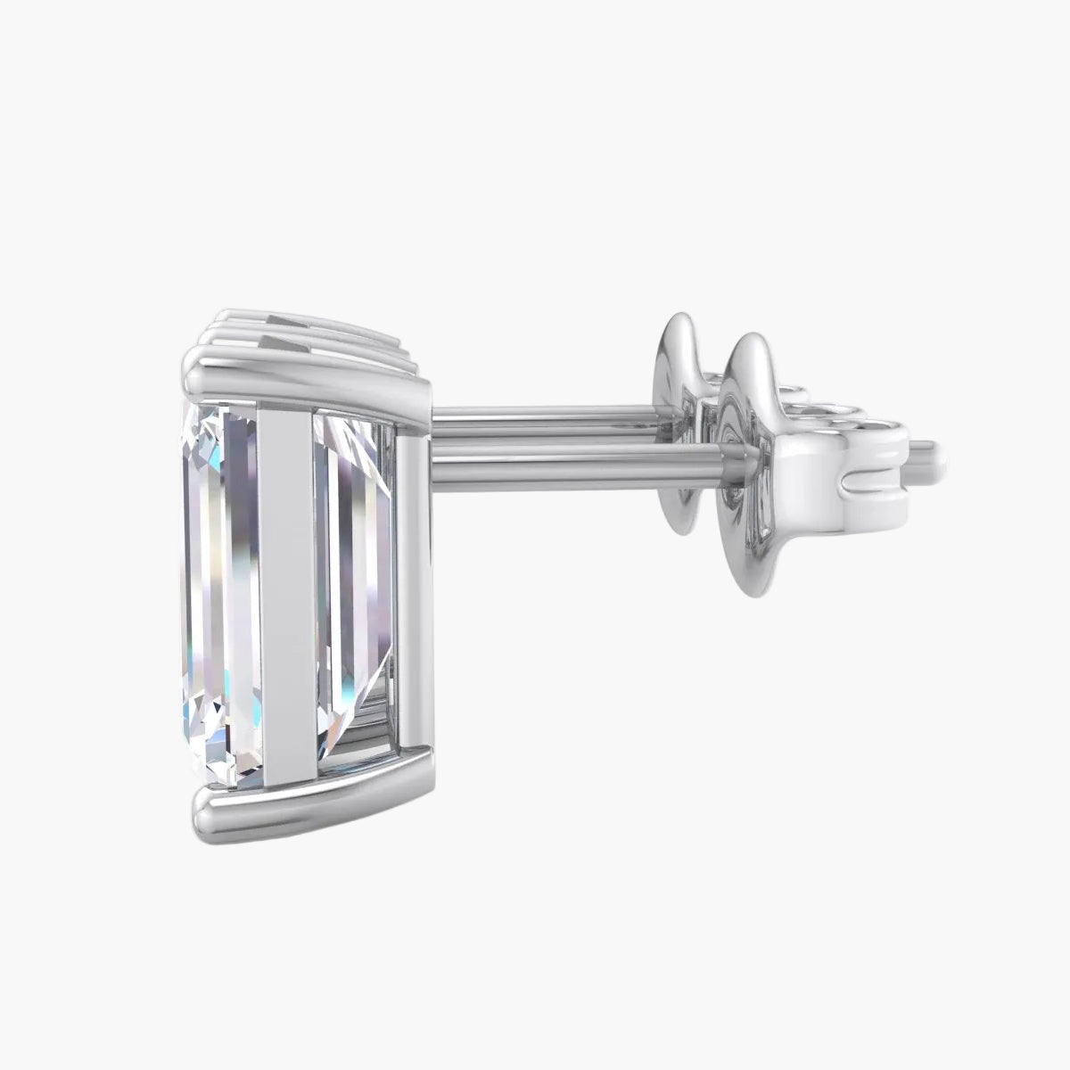 Diamond earring with rectangular cut gemstone on a white background