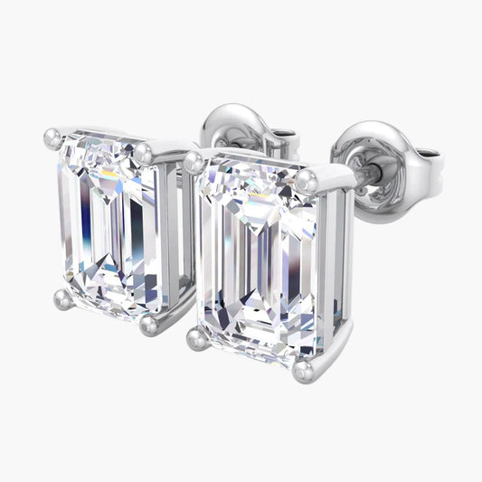 Pair of diamond stud earrings on a white background