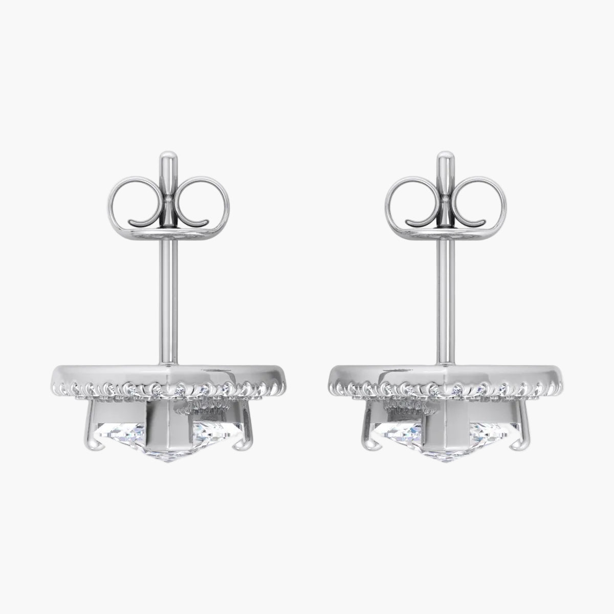 Pair of silver earrings on a white background
