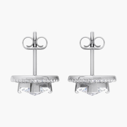 Pair of silver earrings on a white background