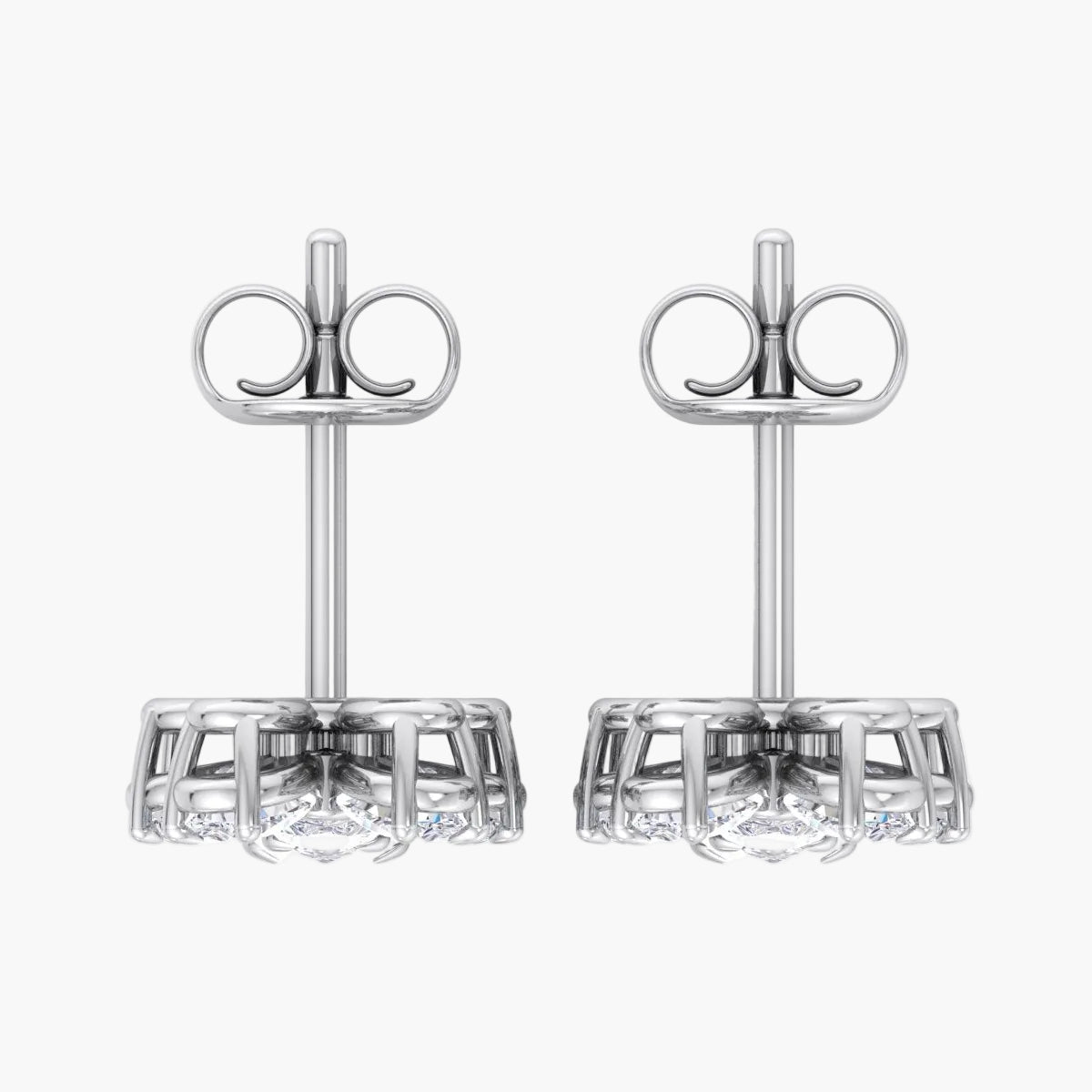 Pair of silver earrings on a white background