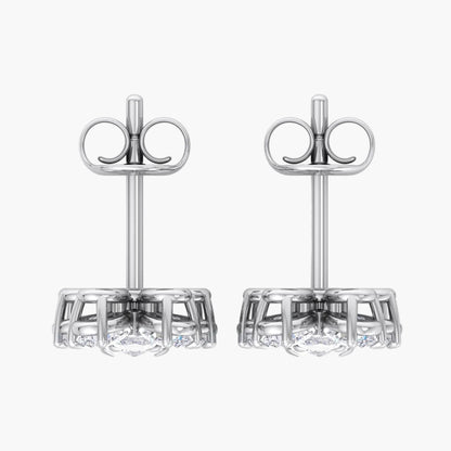 Pair of silver earrings on a white background