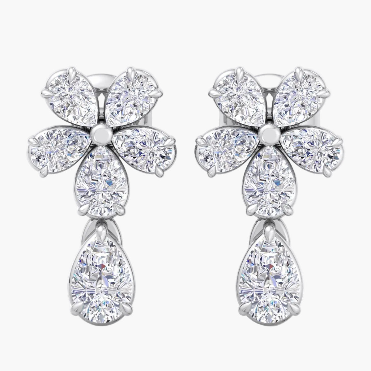 Pair of diamond earrings on a white background