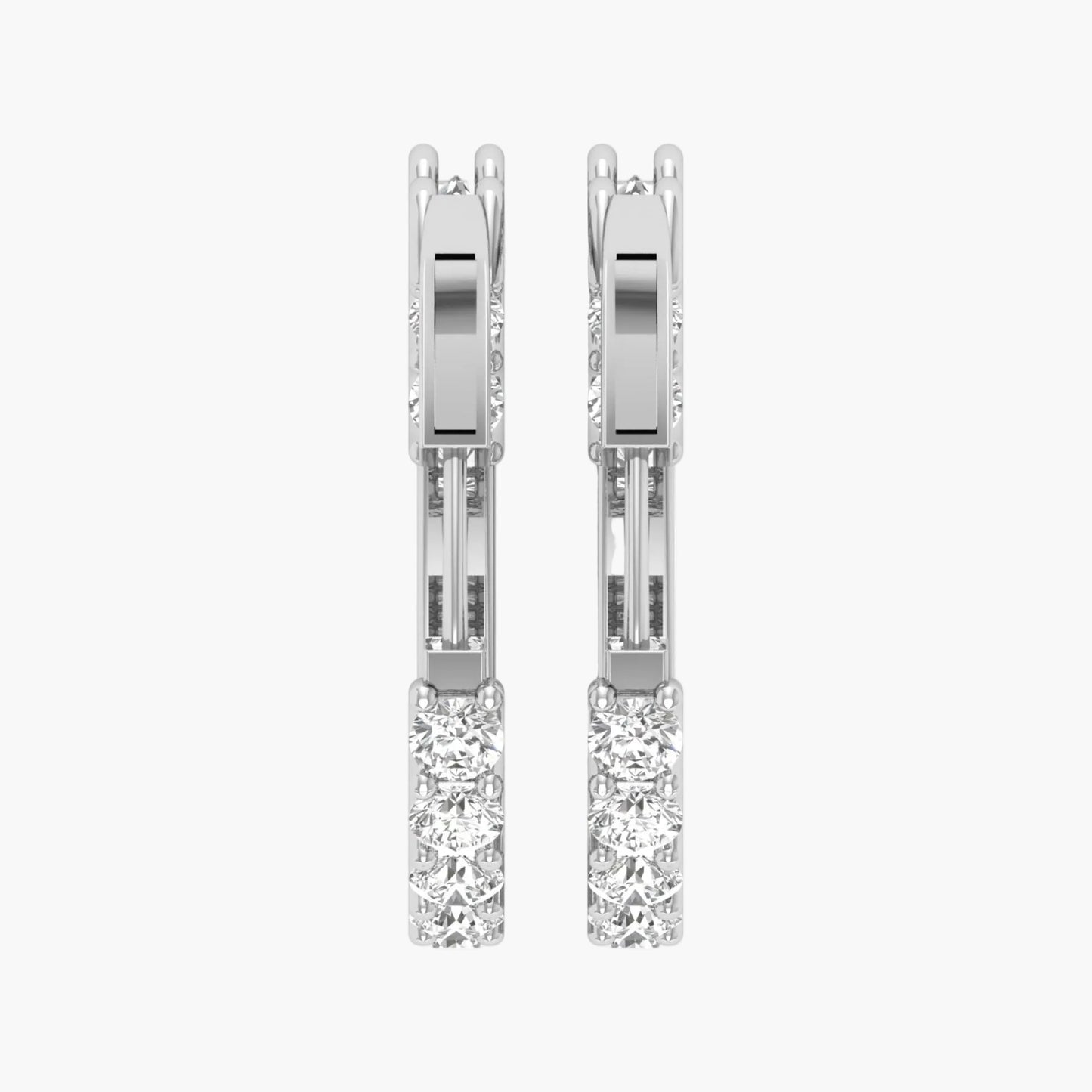 Pair of diamond earrings on a white background
