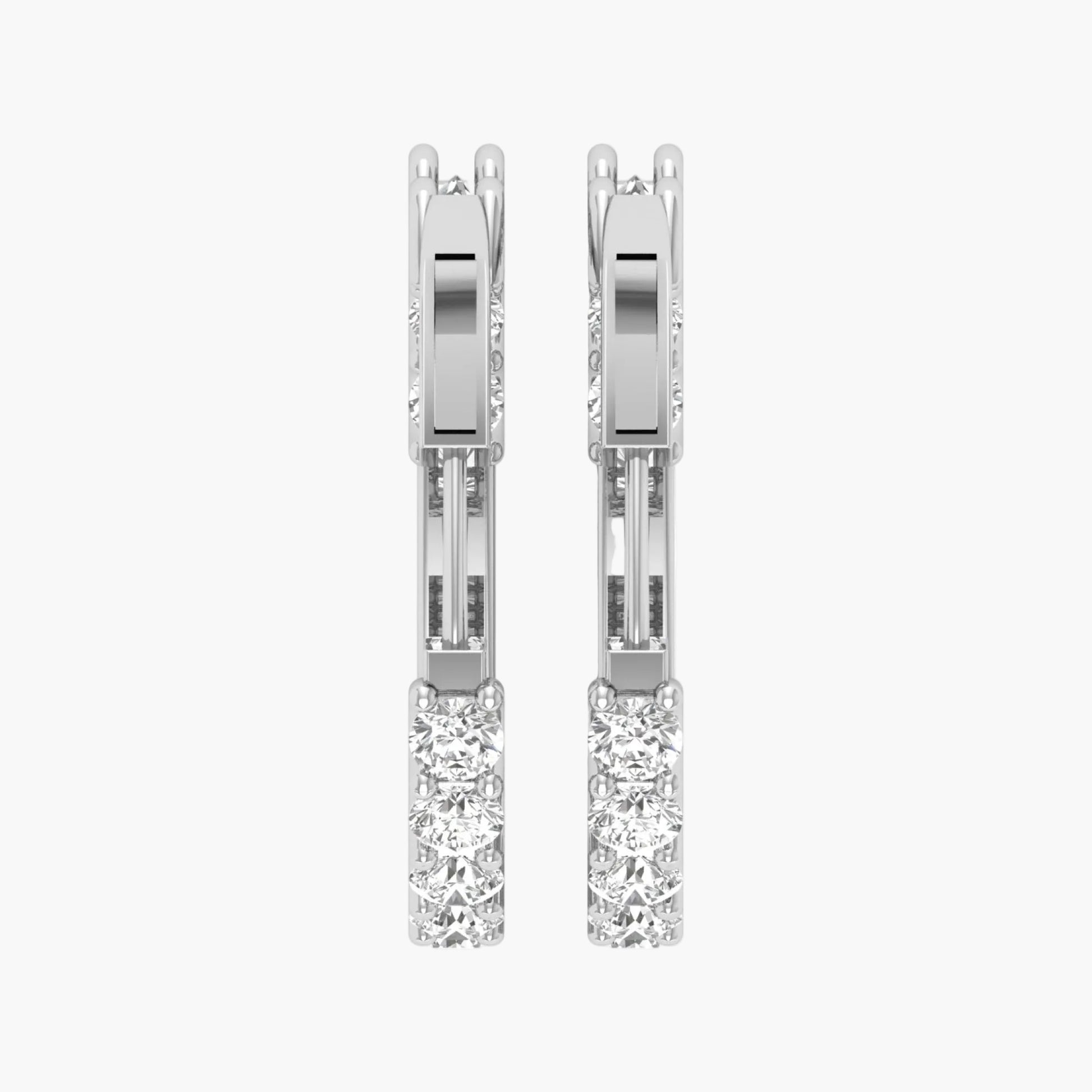 Pair of diamond earrings on a white background