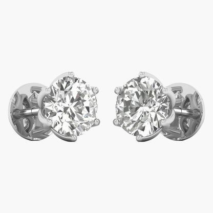 Pair of diamond stud earrings on a white background