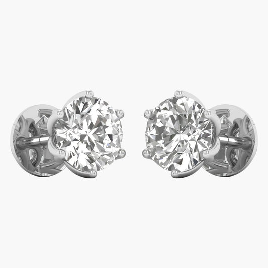 Pair of diamond stud earrings on a white background