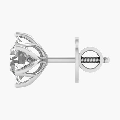 Silver earring with a clear gemstone on a white background