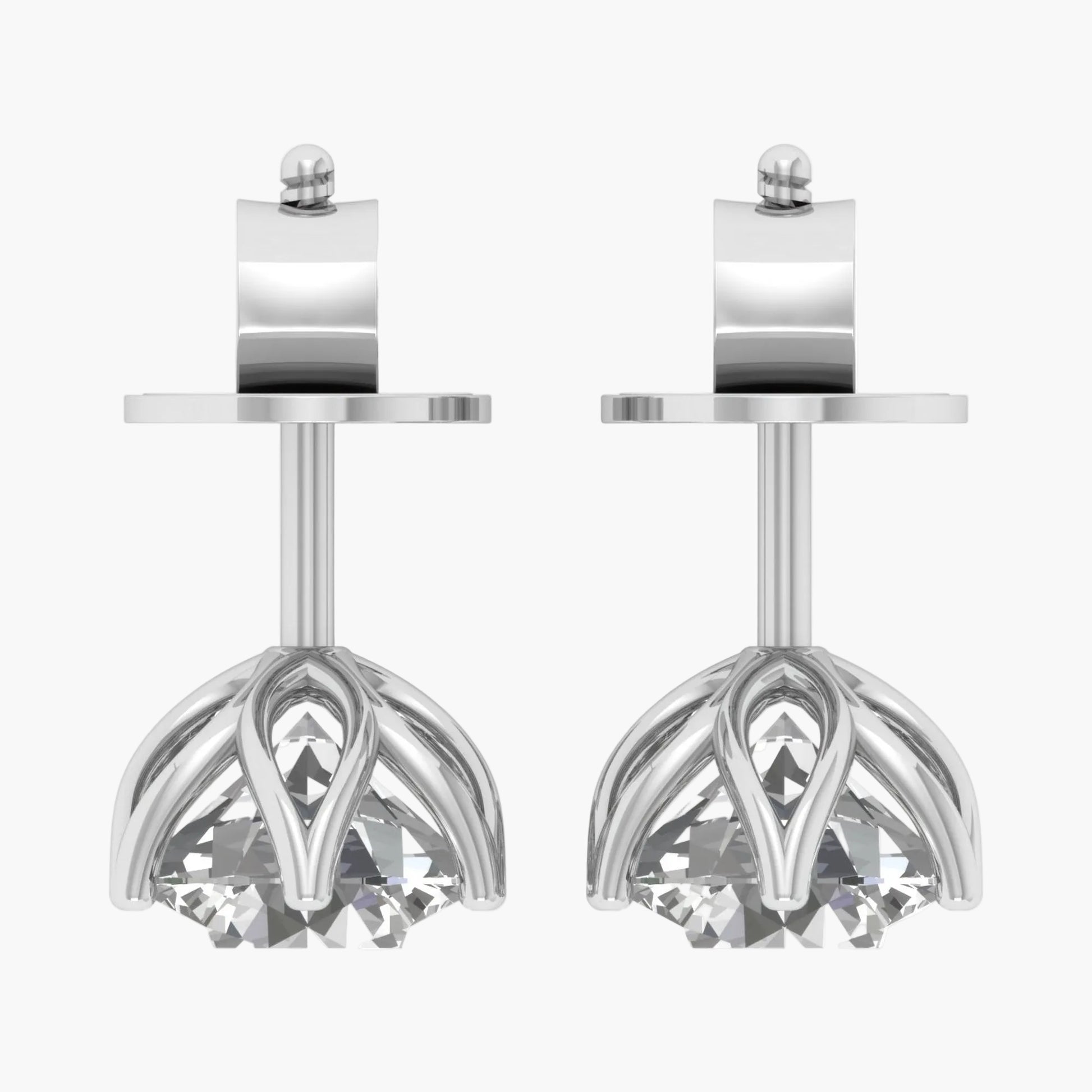 Pair of silver earrings with crystal-like tops on a white background