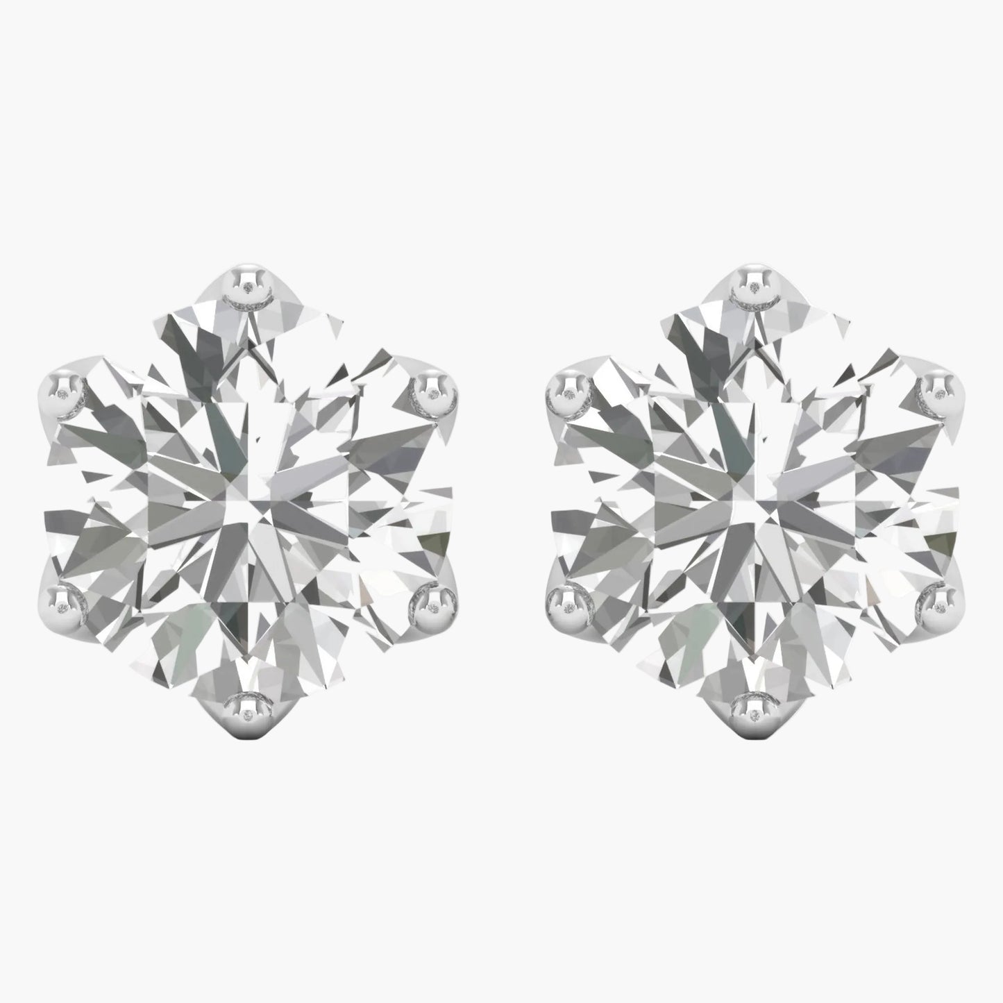 Pair of diamond stud earrings on a white background