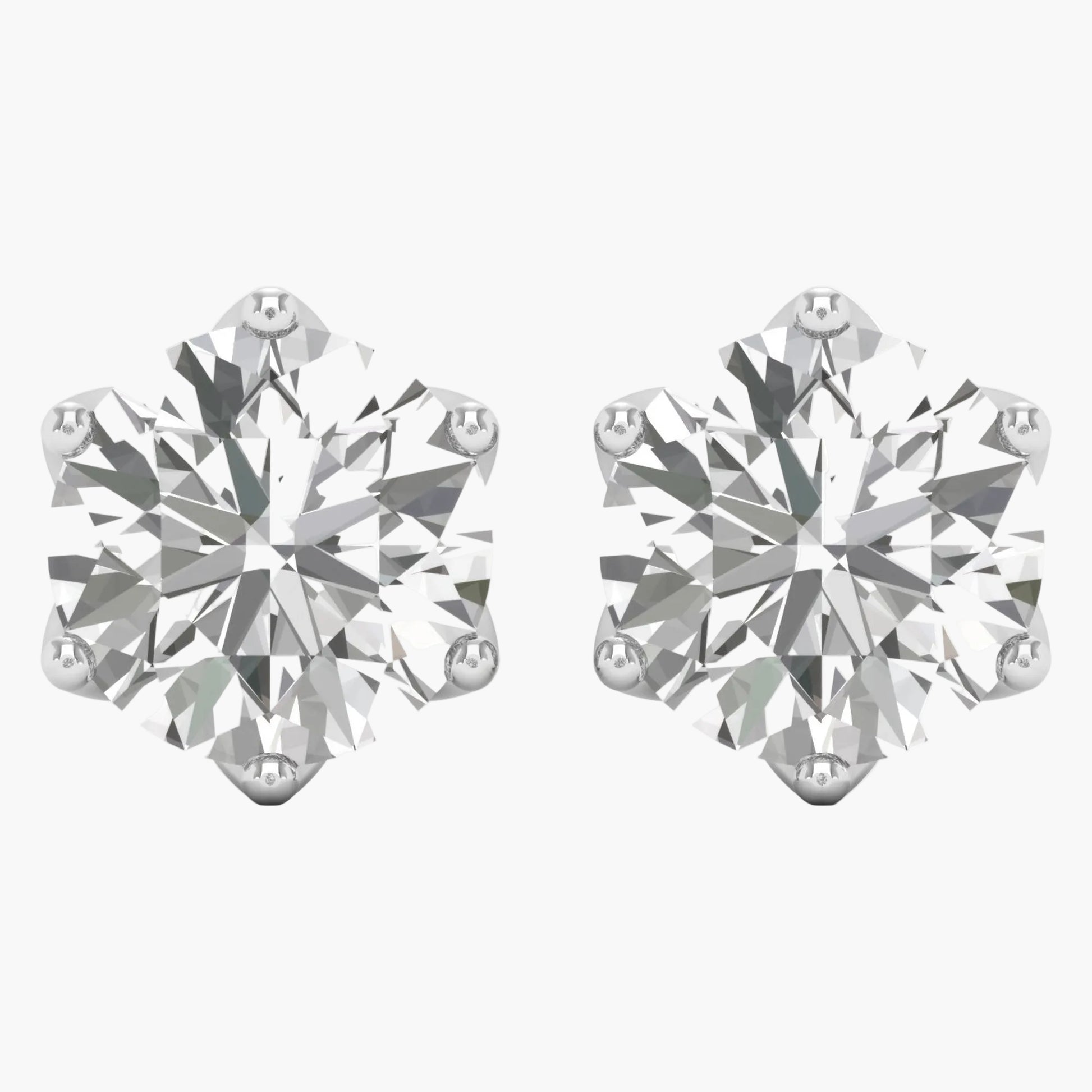 Pair of diamond stud earrings on a white background