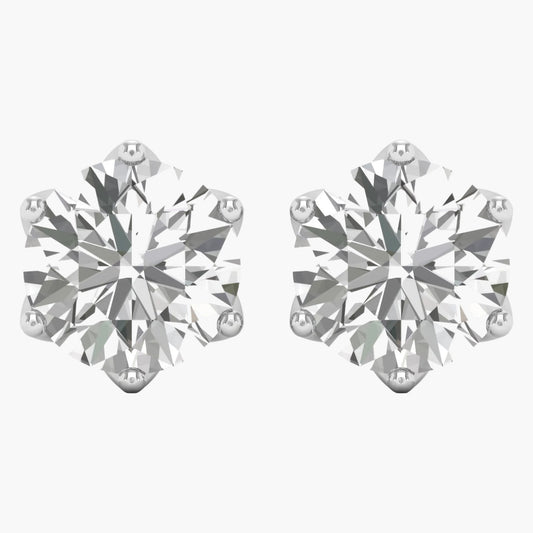 Pair of diamond stud earrings on a white background