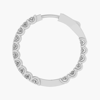 Silver hoop earring with heart-shaped cutout design on a white background